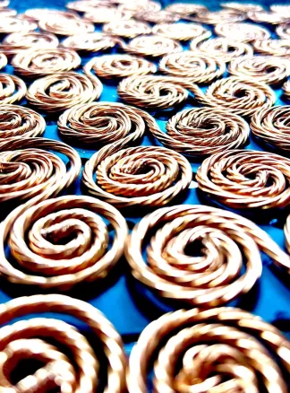 Copper Triskelion Coils – Harnessing Sacred Geometry for Energy Balance