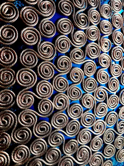 Copper Triskelion Coils – Harnessing Sacred Geometry for Energy Balance